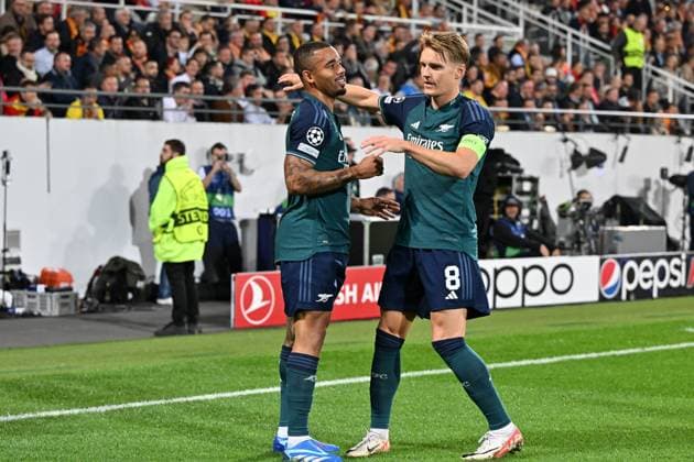 231003 RC Lens vs Arsenal Gabriel Jesus (9) of Arsenal celebrates with Martin Odegaard (8) of Arsenal after scoring the 0-1 goal during the Uefa Champions League matchday 2 game in group B in the 2023-2024 season between Racing Club de Lens and Arsenal FC on October 3 , 2023 in Lens, France. (Photo by David Catry Isosport) LENS FRANCE  Copyright: xx 408499