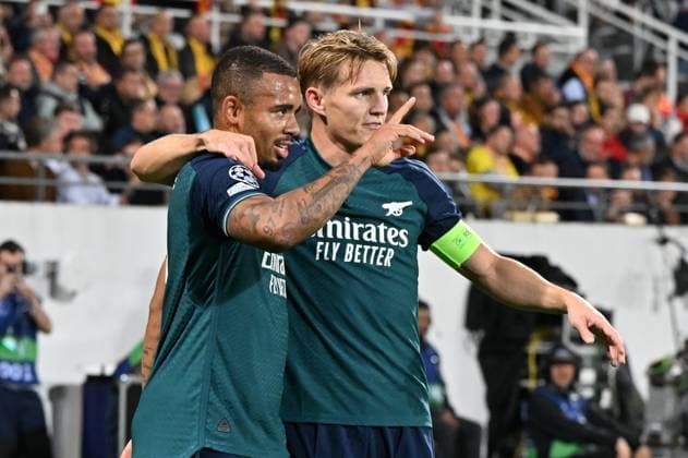 231003 RC Lens vs Arsenal Gabriel Jesus (9) of Arsenal celebrates with Martin Odegaard (8) of Arsenal after scoring the 0-1 goal during the Uefa Champions League matchday 2 game in group B in the 2023-2024 season between Racing Club de Lens and Arsenal FC on October 3 , 2023 in Lens, France. (Photo by David Catry Isosport) LENS FRANCE  Copyright: xx 408501