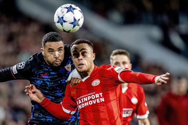 EINDHOVEN, Netherlands, 03-10-2023, SPO, Philips stadium, Champions League, season 2023 2024, Sevilla FC player Youssef En-Nesyri, PSV player Sergino Dest during the match PSV - Sevilla, Netherlands, Eindhoven on 3 oktober 2023 PSV - Sevilla x22612844x Copyright: