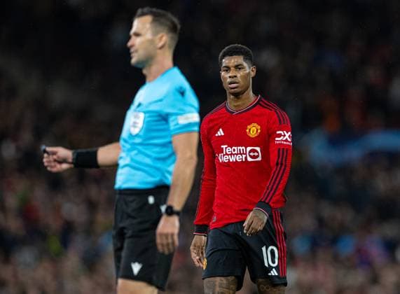 Football - UEFA Champions League - Group A - Manchester United, ManU FC v Galatasaray S.K. MANCHESTER, ENGLAND - Tuesday, October 3, 2023: Manchester United s Marcus Rashford (R) and referee Ivan KruÅ¾liak during the UEFA Champions League Group A match between Manchester United FC and Galatasaray S.K. at Old Trafford. MANCHESTER Old Trafford GREATER MANCHESTER ENGLAND  Copyright: xDavidxRawcliffex P2023-10-03-Man_Utd_Galatasaray-36