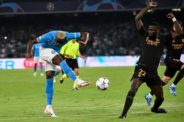 Victor Osimhen of SSC Napoli and Antonio Rudiger of Real Madrid CF during the Champions League Group C football match between SSC Napoli and Real Madrid FC at Diego Armando Maradona stadium in Naples (Italy), October 3rd, 2023. AndreaxStaccioli