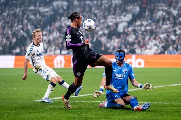 231003 Leroy SanÃ of Bayern Munich and goalkeeper Kamil Grabara of Copenhagen during the UEFA Champions League football match between FC Copenhagen and Bayern Munich on October 3, 2023 in Copenhagen Photo Petter Arvidson BILDBYRAN kod PA PA0658 fotboll football soccer fotball champions league fc copenhagen bayern münchen bbeng bayern munich fc köpenhamn  Copyright: PETTERxARVIDSON BB231003PA125
