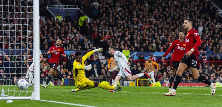 Football - UEFA Champions League - Group A - Manchester United, ManU FC v Galatasaray S.K. MANCHESTER, ENGLAND - Tuesday, October 3, 2023: Galatasaray s Kerem AktürkoÄülu beats Manchester United s goalkeeper AndrÃ Onana to score the second equalising goal during the UEFA Champions League Group A match between Manchester United FC and Galatasaray S.K. at Old Trafford. MANCHESTER Old Trafford GREATER MANCHESTER ENGLAND  Copyright: xDavidxRawcliffex P2023-10-03-Man_Utd_Galatasaray-65