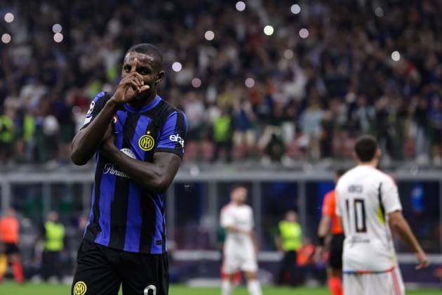 Milan, Italy, 3rd October 2023. Marcus Thuram of FC Internazionale celebrates after scoring to give the side a 1-0 lead during the UEFA Champions League match at Giuseppe Meazza, Milan. Picture credit should read: Jonathan Moscrop Sportimage EDITORIAL USE ONLY. No use with unauthorised audio, video, data, fixture lists, club league logos or live services. Online in-match use limited to 120 images, no video emulation. No use in betting, games or single club league player publications. SPI-2603-0028