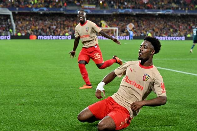 231003 RC Lens vs Arsenal Elye Wahi (9) of RC Lens celebrates after scoring the 2-1 goal during the Uefa Champions League matchday 2 game in group B in the 2023-2024 season between Racing Club de Lens and Arsenal FC on October 3 , 2023 in Lens, France. (Photo by David Catry Isosport) LENS FRANCE  Copyright: xx 408613