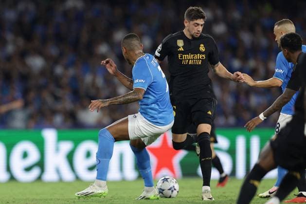 UEFA Champions League football match - SSC Napoli vs Real Madrid FC Real Madrid s Uruguayan midfielder Federico Valverde challenges for the ball with SSC NapoliÃ¢& x80;& x99;s Brazilian defender Natan Bernardo de Souza during the Uefa champions league match between SSC Napoli vs Real Madrid at the Diego Armando Maradona Stadium in Naples, southern Italy, on October 03, 2023. Naples Italy  Copyright: xIPAxSport ABACAx BRIPASport20231003_425 IPAxSport ABACAx BRIPASport20231003_425
