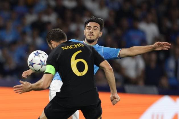 Italy: Serie a football match SSC Napoli vs Real Madrid SSC Napoli s Macedonian midfielder Eljif Elmas challenges for the ball with Real Madrid s Spanish defender Nacho Fernandez during the Uefa champions league match between SSC Napoli vs Real Madrid at the Diego Armando Maradona Stadium in Naples, southern Italy, on October 03, 2023. ABPH4403 Copyright: xAntonioxBalascox