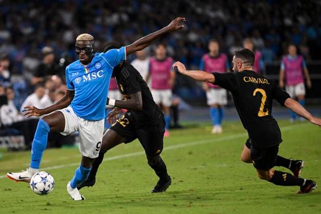 Victor Osimhen of SSC Napoli, Antonio Rudiger and Dani Carvajal of Real Madrid CF compete for the ball during the Champions League Group C football match between SSC Napoli and Real Madrid FC at Diego Armando Maradona stadium in Naples (Italy), October 3rd, 2023. AndreaxStaccioli
