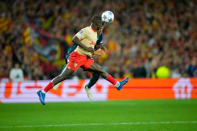 October 3, 2023, Lens, France: DEIVER MACHADO and TAKEHIRO TOMIYASU fights for the ball in the air during the Champions League pool game between Lens and Arsenal at Stade Felix Bollaert on October 3, 2023 in Lens, France. Lens France - ZUMAg253 20231003_zip_g253_044 Copyright: xGlennxGervotx