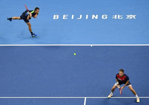 (231004) -- BEIJING, Oct. 4, 2023 -- Wesley Koolhof (L) of Netherlands and Neal Skupski of Britain compete during the men s doubles final between Wesley Koolhof Neal Skupski and Austin Krajicek Ivan Dodig at 2023 China Open tennis tournament in Beijing, capital of China, Oct. 4, 2023. ) (SP)CHINA-BEIJING-TENNIS-CHINA OPEN-MEN S DOUBLES-FINAL (CN) ZhangxChenlin 