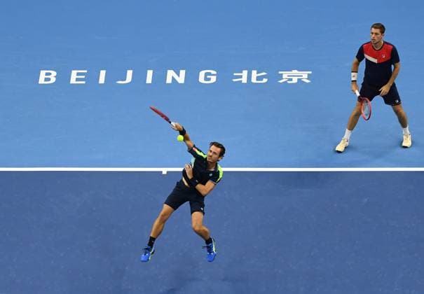 (231004) -- BEIJING, Oct. 4, 2023 -- Wesley Koolhof (L) of Netherlands and Neal Skupski of Britain compete during the men s doubles final between Wesley Koolhof Neal Skupski and Austin Krajicek Ivan Dodig at 2023 China Open tennis tournament in Beijing, capital of China, Oct. 4, 2023. ) (SP)CHINA-BEIJING-TENNIS-CHINA OPEN-MEN S DOUBLES-FINAL (CN) ZhangxChenlin 