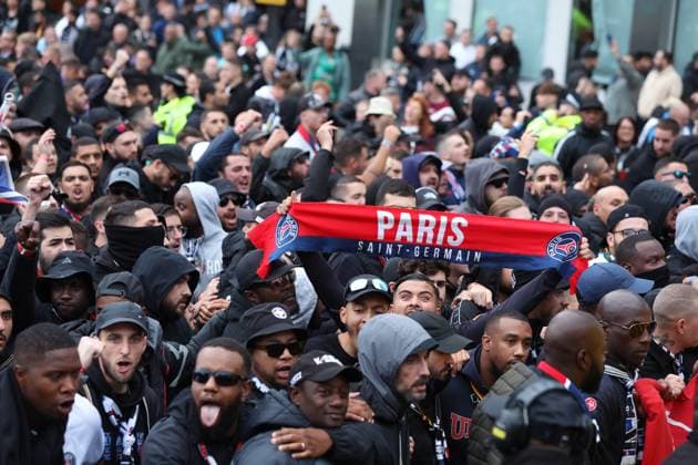 Newcastle Upon Tyne, England, 4th October 2023. Paris Saint Germain fans arrive ahead of the UEFA Champions League match at St. James Park, Newcastle Upon Tyne. Picture credit should read: Nigel Roddis Sportimage EDITORIAL USE ONLY. No use with unauthorised audio, video, data, fixture lists, club league logos or live services. Online in-match use limited to 120 images, no video emulation. No use in betting, games or single club league player publications. SPI-2627-0006