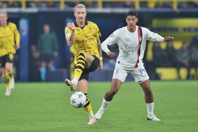 Champions League Borussia Dortmund AC Milan on 04 10 2023 at Signal Iduna Park in Dortmund Marco Reus Dortmund in a duel against Tijjani Reijnders AC Milan MT