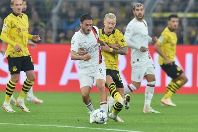 Champions League Borussia Dortmund AC Milan on 04 10 2023 at Signal Iduna Park in Dortmund Davide Calabria AC Milan in a duel against Marco Reus Dortmund MT