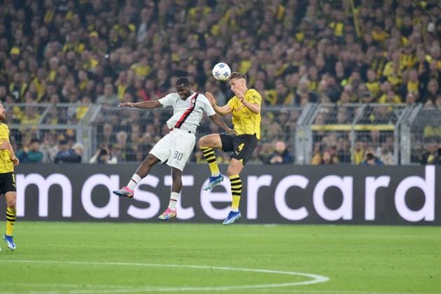 Champions League Borussia Dortmund AC Milan on 04 10 2023 at Signal Iduna Park in Dortmund Yunus Musah AC Milan in a duel against Nico Schlotterbeck Dortmund MT