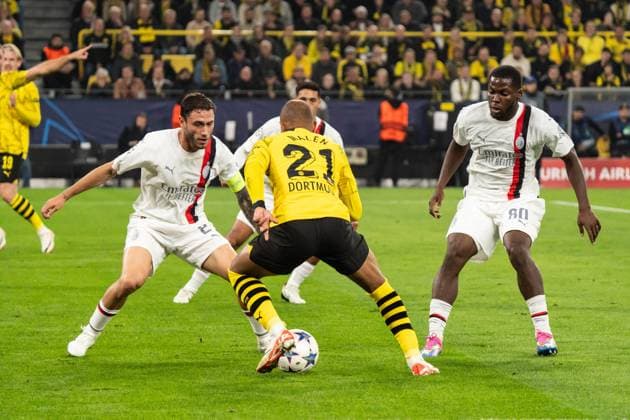 GER, Champions League BV Borussia Dortmund vs AC Milan Milan 04 10 2023, Signal Iduna Park, Dortmund, GER, Champions League BV Borussia Dortmund vs AC Milan Milan In picture Donyell painting BV Borussia Dortmund, 21 full body full body ball on foot duel between Yunus Musah AC Milan Milan, 80 Davide Calabria AC Milan Milan, 2 nordphotoxGmbHxx xChristianxSchulze nph000300