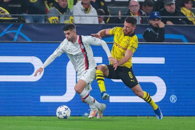 04 10 2023, football, 2023 2024 season, UEFA Champions League, group stage, Borussia Dortmund AC Milan, v l Christian Pulisic AC Milan , Salih Özcan Borussia Dortmund , Dortmund Signal Iduna Park NRW Germany xRHR PHOTO DEx Copyright: DennisxEwert RHR-FOTOx RHR-FOTO DE