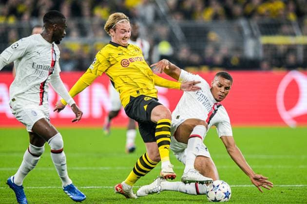DORTMUND - (l-r) Julian Brandt of Borussia Dortmund, Malick Thiaw of AC Milan during the UEFA Champions League match between Borussia Dortmund and AC Milan at Signal Iduna Park on October 4, 2023 in Dortmund, Germany. ANP Hollandse Hoogte UEFA Champions League 2023 24 2023 2024 xVIxANPxSportx xGerritxvanxKeulenxIVx 480240591 originalFilename: 480240591.jpg