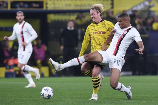 Soccer Champions group stage 2 matchday Borussia Dortmund AC Milan on 04 10 2023 at Signal Iduna Park in Dortmund Malick Thiaw Milan , front Julian Brandt Dortmund , rear xRx