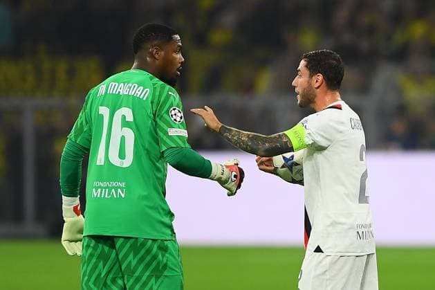 DORTMUND, GERMANY - 04.10.23: Davide Calabria, Mike Maignan, The match of match UEFA Champion League Borussia Dortmund vs AC Milan at SIGNAL IDUNA PARK  Copyright: xVITALIIxKLIUIEVx