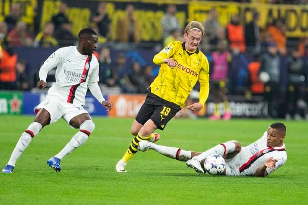 UEFA Champions League, Borussia Dortmund AC Milan, 04 10 2023 Julian Brandt Borussia Dortmund, 19 , Malick Thiaw AC Milan, 28 , UEFA Champions League, Borussia Dortmund AC Milan, 2 group match, on 4 10 2023, Signal Iduna Park, Dortmund UEFA regulations prohibit any use of photographs as image sequences and or quasi video Copyright: xBEAUTIFULxSPORTS Meuselx
