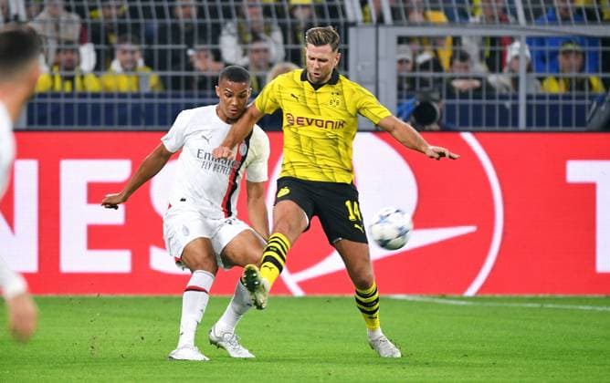 Football, Champions League, Germany, Men, Season 2023 2024, Matchday 2, Signal Iduna Park Dortmund Bor Dortmund AC Milan Niklas Füllkrug BVB , Malick Thiaw ACM Action UEFA REGULATES PROHIBIT ANY USE OF PHOTOGRAPHS AS IMAGE SEQUENCES AND OR QUASI VIDEO