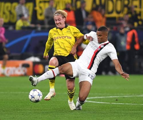 04 10 2023, Dortmund, Germany, Signal Iduna Park, Borussia Dortmund vs AC Milan UEFA Champions League 2023 2024 Group F, Julian Brandt Borussia Dortmund and Malick Thiaw AC Milan in duel Photo Ralf Treese Dortmund Signal Iduna Park North Rhine Westphalia Germany 521_BVBACM20231004_011 Treese-521