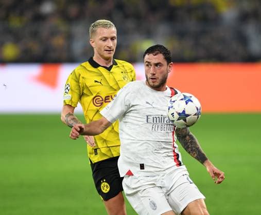 04 10 2023, Dortmund, Germany, Signal Iduna Park, Borussia Dortmund vs AC Milan UEFA Champions League 2023 2024 Group F, Marco Reus Borussia Dortmund and Davide Calabria AC Milan in duel Photo Ralf Treese Dortmund Signal Iduna Park North Rhine Westphalia Germany 521_BVBACM20231004_012 Treese-521