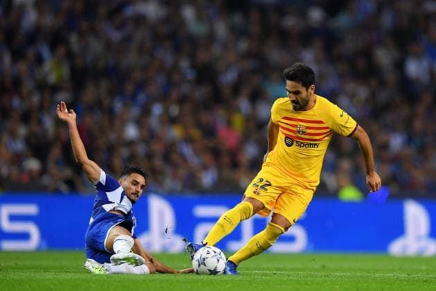 4th October 2023: Dragao Stadium, Porto, Portugal; Champions League Football, Porto versus FC Barcelona, Barca Stephen Eust& xe1;quio of Porto slide tackles Ilkay Gundogan of Barcelona  ActionPlus12561483 DanielxCastro