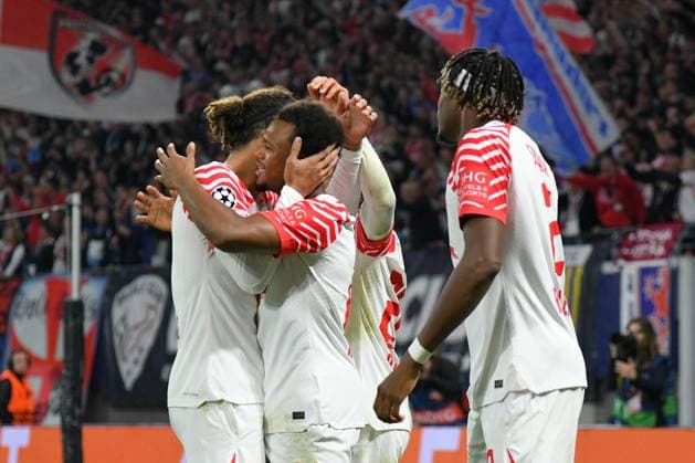 Lois Openda RB Leipzig center, scores the 1 1, Yussuf Poulsen RB Leipzig left and Mohamed Simakan RB Leipzig right RB Leipzig vs Manchester City, soccer, Champions League, preliminary round, match day 2, 2023 2024 season, 04 10 2023 RB Leipzig vs Manchester City, soccer, Champions League, preliminary round, match day 2, 2023 2024 season, 04 10 2023 Leipzig. Copyright: xEibner-Pressefoto BertxHarzerx EP_BHR