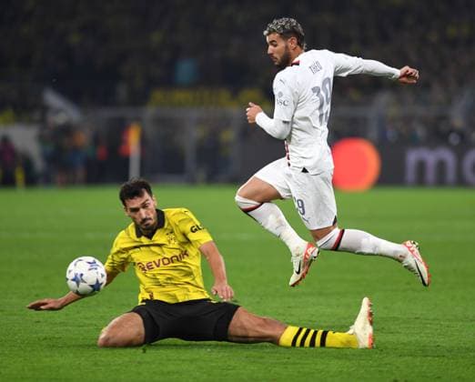 04 10 2023, Dortmund, Germany, Signal Iduna Park, Borussia Dortmund vs AC Milan UEFA Champions League 2023 2024 Group F, Mats Hummels Borussia Dortmund and Theo Hernandez AC Milan in duel Foto Ralf Treese Dortmund Signal Iduna Park North Rhine Westphalia Germany 521_BVBACM20231004_031 Treese-521