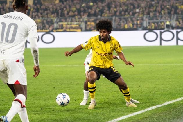GER, Champions League BV Borussia Dortmund vs AC Milan Milan 04 10 2023, Signal Iduna Park, Dortmund, GER, Champions League BV Borussia Dortmund vs AC Milan Milan In the picture duel between Karim Adeyemi BV Borussia Dortmund, 27 and Tijjani Reijnders AC Milan Milan, 14 nordphotoxGmbHxx xChristianxSchulze nph000300