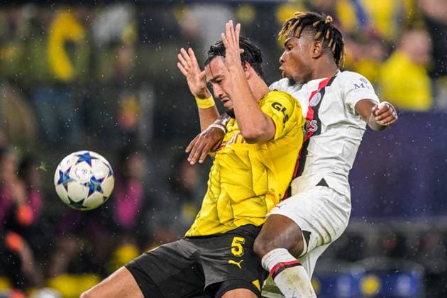 DORTMUND - (l-r) Ramy Bensebaini of Borussia Dortmund, Samuel Chukwueze of AC Milan during the UEFA Champions League match between Borussia Dortmund and AC Milan at Signal Iduna Park on October 4, 2023 in Dortmund, Germany. ANP Hollandse Hoogte UEFA Champions League 2023 24 2023 2024 xVIxANPxSportx xGerritxvanxKeulenxIVx 480248323 originalFilename: 480248323.jpg