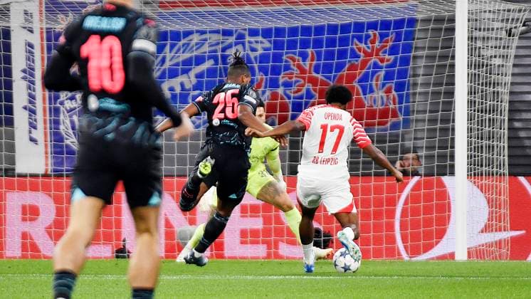 Soccer UEFA Champions League, 2023 2024 season, group stage, matchday 2, RB Leipzig vs Manchester City 04 10 2023 goal scorer Lois Openda center back RB Leipzig, back number 17, 17 re scores against Manuel Akanji center back Manchester City, back number 25 and Ederson goalkeeper Manchester City, back number 31 the 1 1 during the match RB Leipzig vs Manchester City 04 10 2023 Leipzig Saxony Germany Red Bull Arena