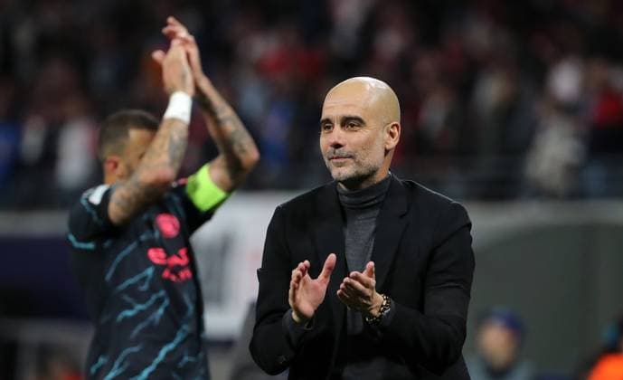 Coach Pep Guardiola satisfied clapping to fans after end of match Sports Football Soccer UEFA Champions League UCL Mens 2 Matchday Season 2023 2024 04 10 2023 Rasen Ballsport RB Leipzig RBL vs Manchester City DFL regulations prohibit any use of photographs as image sequences and or quasi video