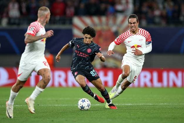 04 10 2023, Football UEFA Champions League 2023 2024, Group stage, Matchday 2, RB Leipzig Manchester City, at Red Bull Arena Leipzig L R Rico Mark Lewis Manchester City vs Yussuf Poulsen RB Leipzig DFL and DFB regulations prohibit any use of photographs as image sequences and or quasi video