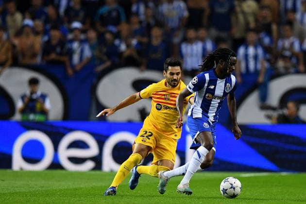 4th October 2023: Dragao Stadium, Porto, Portugal; Champions League Football, Porto versus FC Barcelona, Barca Rom& xe1;rio Bar& xf3; of Porto challenges Ilkay Gundogan of Barcelona  ActionPlus12561551 DanielxCastro