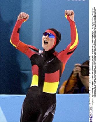 2002 WINTER Olympic Games, Olympische Spiele, Olympia, OS : 2002 WINTER OLYMPIC GAMES : SALT LAKE CITY 02 23 02, KEARNS, UTAH, UNITED STATES --- Claudia Pechstein of Germany celebrates after setting a world record time of 6:46.91 minutes and winning the gold medal in the Ladies 5000-meter Speed skating, Eisschnelllauf competition at the 2002 Olympic Winter games, Winterspiele,Spiele, Summer games --- Photo by Steve Griffin Salt Lake Tribune Corbis Sygma JEUX OLYMPIQUES D HIVER OLYMPISCHE SPELEN www.iso be Ogden United States ETATS UNIS VERENIGDE STATEN  Copyright: xTIMxDExWAELEx 56602