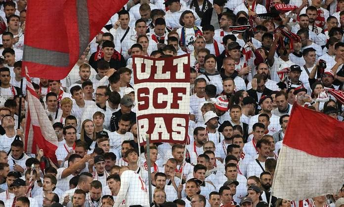 05 10 2023, xhbx, football UEFA Europa League, SC Freiburg West Ham United emspor, v l fans, atmosphere, scarf, flag, banner of SC Freiburg DFL DFB REGULATES PROHIBIT ANY USE OF PHOTOGRAPHS as IMAGE SEQUENCES and or QUASI VIDEO Freiburg