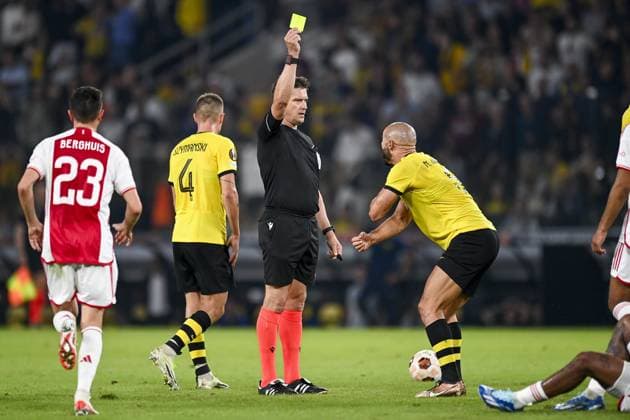 ATHENS, 05-10-2023, OPAP Arena, Europa League Football, season 2023 2024, AEK Athens FC - Ajax, referee Matej Jug gives a yellow card to AEK Athens player Nordin Amrabat AEK Athens - Ajax  x22638226x Copyright: