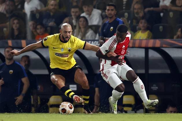 ATHENS - (l-r) Nordin Amrabat of AEK Athens, Amourricho van Axel Dongen of Ajax during the UEFA Europa League match between AEK Athens and Ajax Amsterdam at the OPAP Arena on October 5, 2023 in Athens, Greece. ANP MAURICE VAN STEEN UEFA Europa League 2023 2024 xVIxANPxSportx xxANPxIVx 480323697 originalFilename: 480323697.jpg