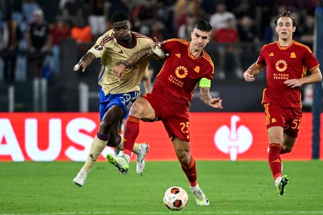 Chris Bedia of Servette FC and Gianluca Mancini of AS Roma compete for the ball during the Europa League Group G football match between AS Roma and Servette FC at Olimpico stadium in Rome (Italy), October 5th, 2023. andreaxstaccioli