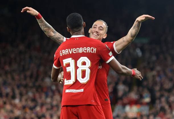 5th October 2023; Anfield, Liverpool, Merseyside, England; Europa League Football, Liverpool versus Union Saint-Gilloise; Ryan Gravenberch of Liverpool celebrates his 44th minute opening goal with team mate Kostas Tsimikas  ActionPlus12561746 DavidxBlunsden