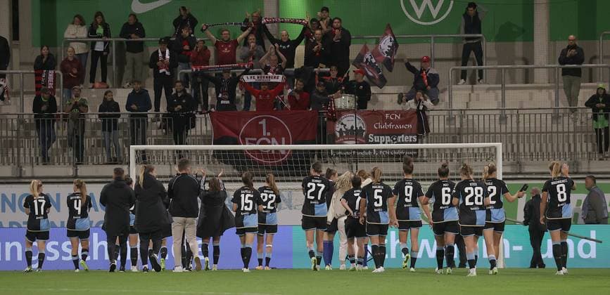 Nuernberg fans celebrate their team soccer, women, season 2023 2024, 1 Liga, Google Pixel Women Bundesliga, VfL Wolfsburg vs 1 FC Nuernberg, 1 0 DFL REGULATES PROHIBIT ANY USE OF PHOTOGRAPHS AS IMAGE SEQUENCES AND OR QUASI VIDEO