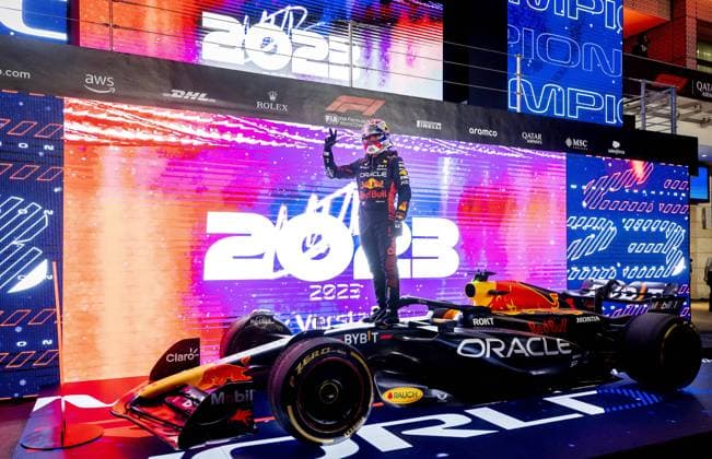 Sport Bilder des Tages QATAR - Max Verstappen (Red Bull Racing) celebrates his third Formula 1 World Championship, WM, Weltmeisterschaft after the sprint race prior to the Formula 1 Grand Prix at the Lusail International Circuit in Qatar. ANP SEM VAN DER WAL Sprint 2023 2024 xVIxANPxSportx xxANPxIVx 480496433 originalFilename: 480496433.jpg