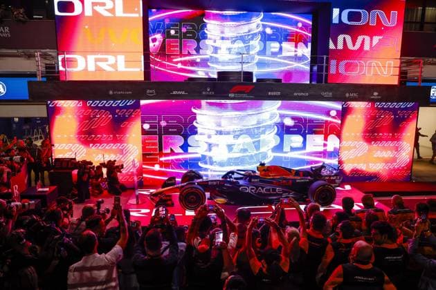 VERSTAPPEN Max (ned), Red Bull Racing RB19, 3-time World Champion celebration during the 2023 Formula 1 Qatar Grand Prix, 17th round of the 2023 Formula One World Championship, WM, Weltmeisterschaft from October 6 to 8, 2023 on the Lusail International Circuit, in Doha, Qatar - F1 - QATAR GRAND PRIX 2023 DPPI Panoramic  _R5_7745