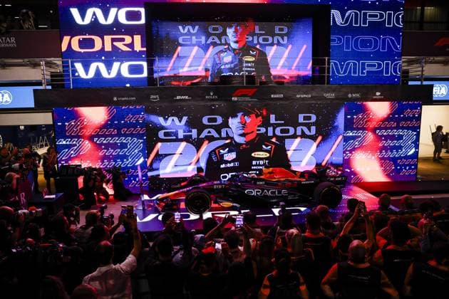 VERSTAPPEN Max (ned), Red Bull Racing RB19, 3-time World Champion celebration during the 2023 Formula 1 Qatar Grand Prix, 17th round of the 2023 Formula One World Championship, WM, Weltmeisterschaft from October 6 to 8, 2023 on the Lusail International Circuit, in Doha, Qatar - F1 - QATAR GRAND PRIX 2023 DPPI Panoramic  _R5_7737
