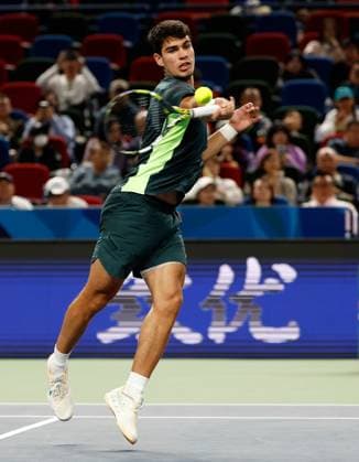 (231011) -- SHANGHAI, Oct. 11, 2023 -- Carlos Alcaraz of Spain returns the ball during the men s singles round of 16 match between Carlos Alcaraz of Spain and Grigor Dimitrov of Bulgaria at the ATP, Tennis Herren Shanghai Masters tennis tournament in Shanghai, east China, Oct. 11, 2023. ) (SP)CHINA-SHANGHAI-TENNIS-ATP TOUR-SHANGHAI MASTERS(CN) WangxLili 