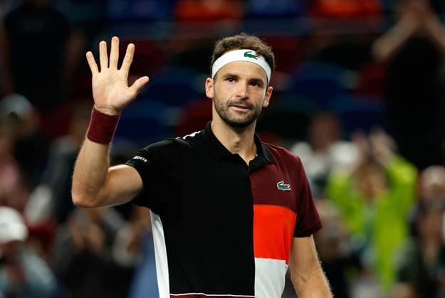 (231011) -- SHANGHAI, Oct. 11, 2023 -- Grigor Dimitrov of Bulgaria waves to the spectators after winning the men s singles round of 16 match between Carlos Alcaraz of Spain and Grigor Dimitrov of Bulgaria at the ATP, Tennis Herren Shanghai Masters tennis tournament in Shanghai, east China, Oct. 11, 2023. ) (SP)CHINA-SHANGHAI-TENNIS-ATP TOUR-SHANGHAI MASTERS(CN) WangxLili 