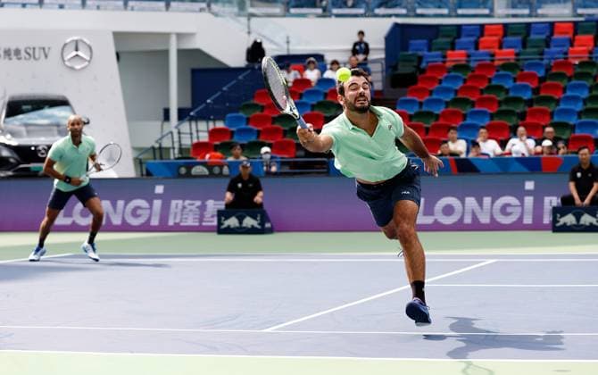 (231012) -- SHANGHAI, Oct. 12, 2023 -- Sadio Doumbia Fabien Reboul(R) of France compete during the men s doubles quaterfinal between Sadio Doumbia Fabien Reboul of France and Wesley Koolhof of the Netherlands Neal Skupski of Britain at the ATP, Tennis Herren World Tour Shanghai Masters tennis tournament at Qizhong Forest Sports City Arena in Shanghai, east China, Oct. 12, 2023. ) (SP)CHINA-SHANGHAI-TENNIS-ATP TOUR-SHANGHAI MASTERS(CN) WangxLili 